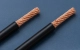 Conductor nicking in wire harnesses compared with an undamaged stripped wire